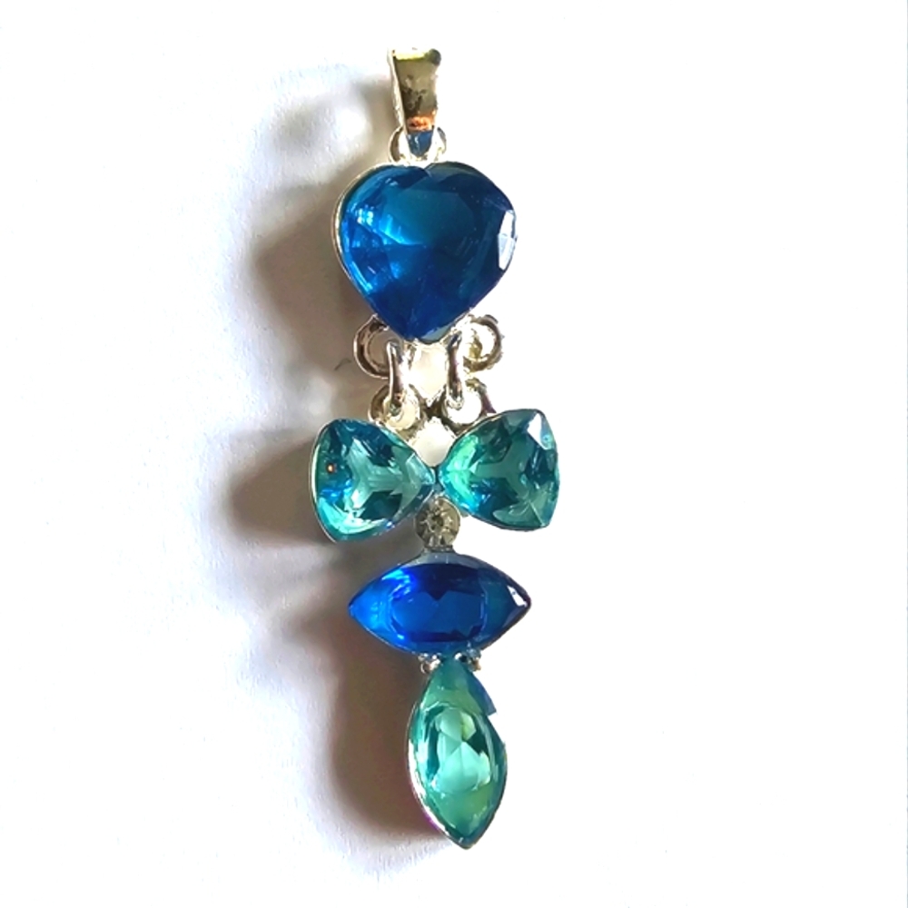 Blue heart pendant and silver tone